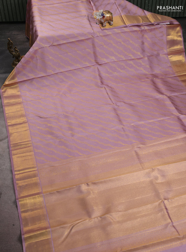 Pure kanchipuram silk saree pastel pink with allover zari leheriya weaves and rich zari woven border