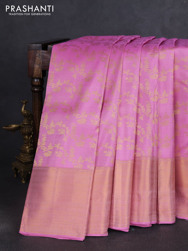 Pure kanchipuram silk saree light pink with allover zari woven leheriya weaves and long rich zari woven border