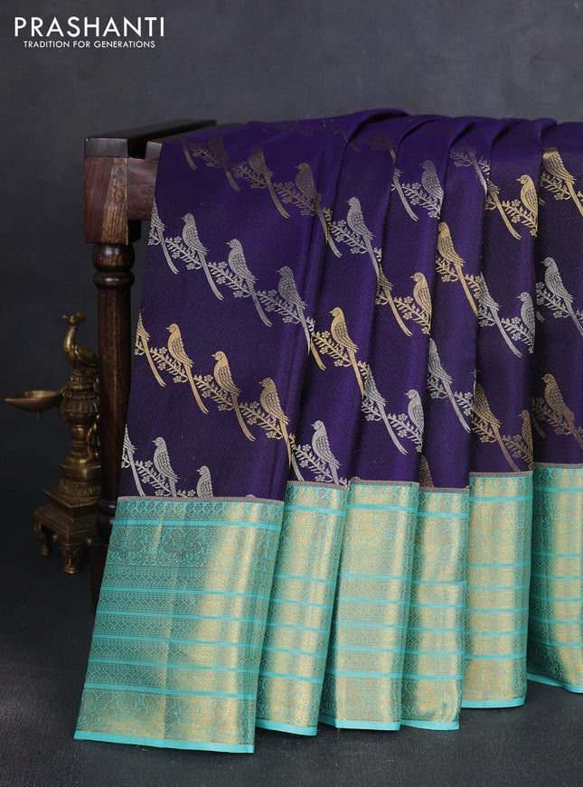 Pure kanchipuram silk saree dark blue and teal green shade with allover zari woven leheriya weaves and long rich zari woven border