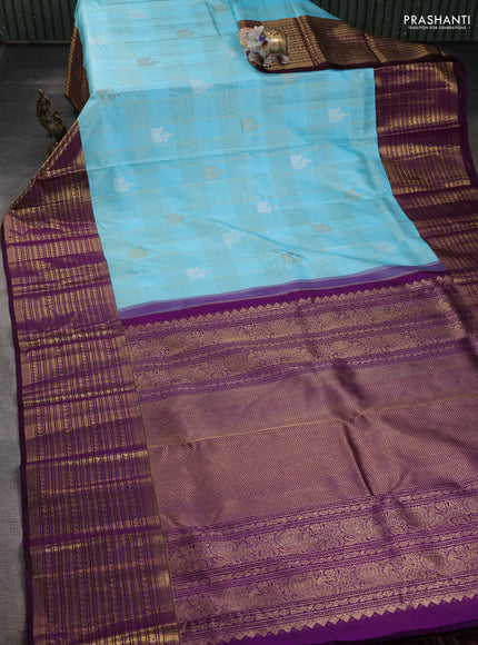 Pure kanchipuram silk saree light blue and purple with allover zari checks & buttas and long rich zari woven border