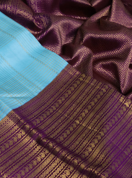 Pure kanchipuram silk saree light blue and purple with allover zari checks & buttas and long rich zari woven border