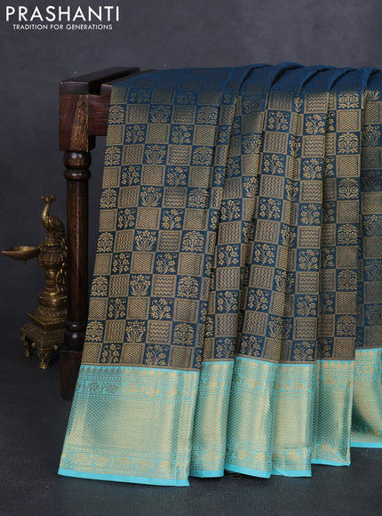 Pure kanchipuram silk saree peacock green and teal blue with allover zari woven brocade weaves and rich zari woven border