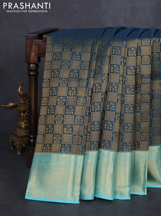 Pure kanchipuram silk saree peacock green and teal blue with allover zari woven brocade weaves and rich zari woven border