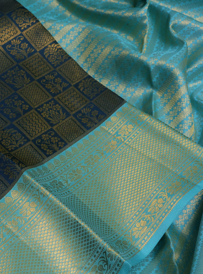 Pure kanchipuram silk saree peacock green and teal blue with allover zari woven brocade weaves and rich zari woven border