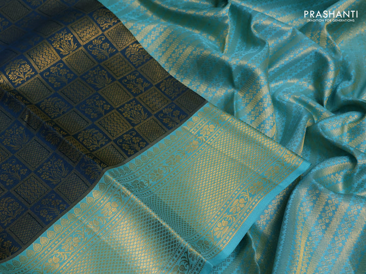 Pure kanchipuram silk saree peacock green and teal blue with allover zari woven brocade weaves and rich zari woven border