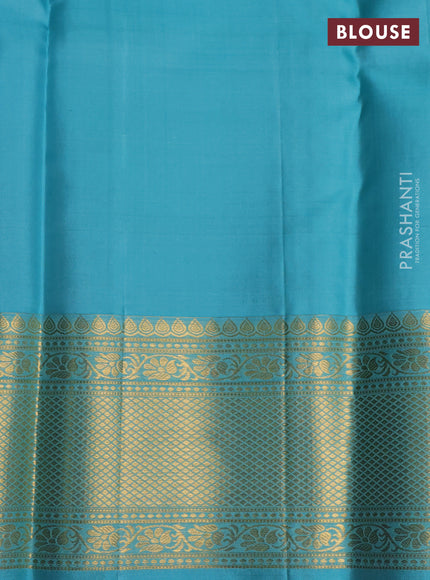 Pure kanchipuram silk saree peacock green and teal blue with allover zari woven brocade weaves and rich zari woven border