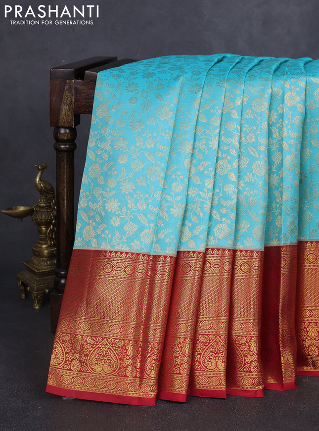 Pure kanchipuram silk saree light blue and red with allover zari woven brocade weaves and long rich zari woven border