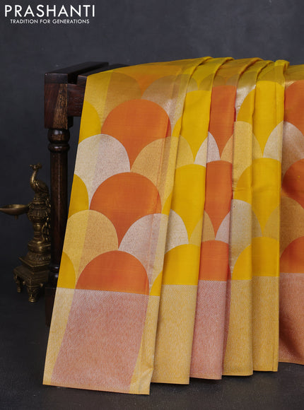 Pure kanchipuram silk saree yellow and dark mustard with allover zari woven geometric brocade weaves and silver zari woven border