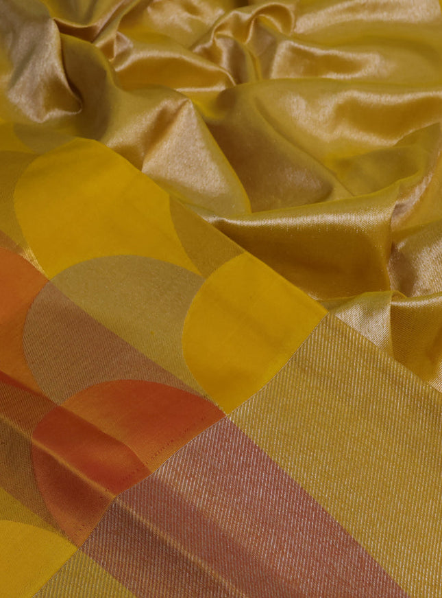 Pure kanchipuram silk saree yellow and dark mustard with allover zari woven geometric brocade weaves and silver zari woven border