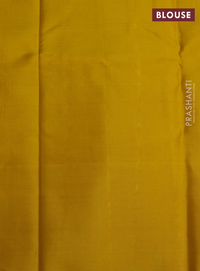 Pure kanchipuram silk saree yellow and dark mustard with allover zari woven geometric brocade weaves and silver zari woven border