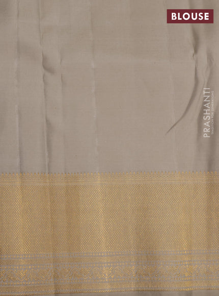 Pure kanchipuram silk saree beige with allover zari weaves and rich zari woven border