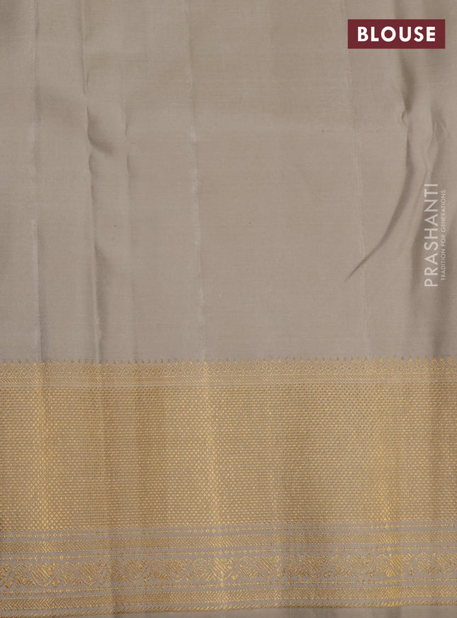 Pure kanchipuram silk saree beige with allover zari weaves and rich zari woven border