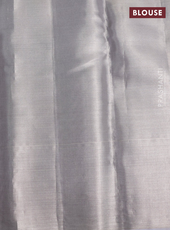 Pure kanchipuram tissue silk saree pastel grey with allover silver & gold zari woven brocade weaves and silver zari woven border