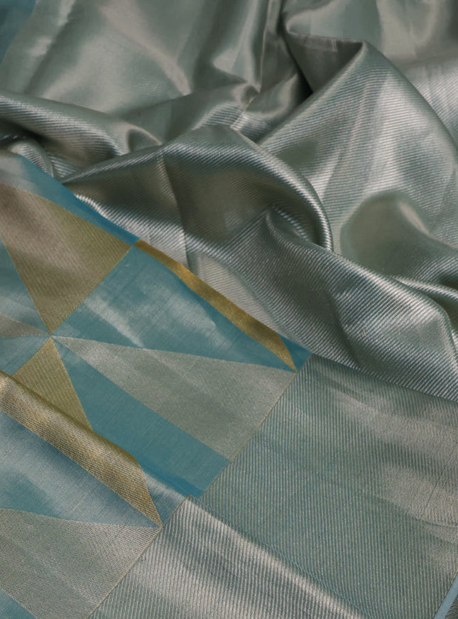 Pure kanchipuram tissue silk saree teal blue with allover zari woven geometric brocade weaves and silver zari woven border