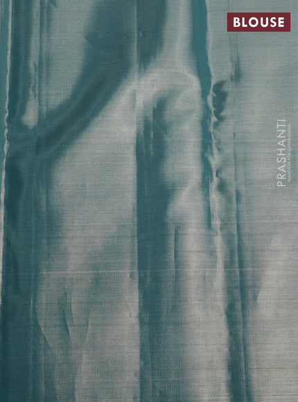 Pure kanchipuram tissue silk saree teal blue with allover zari woven geometric brocade weaves and silver zari woven border