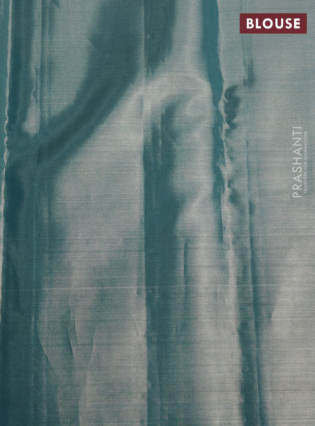 Pure kanchipuram tissue silk saree teal blue with allover zari woven geometric brocade weaves and silver zari woven border