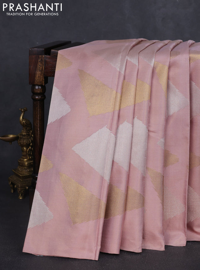 Pure kanchipuram silk saree pastel peach with allover zari woven geometric brocade weaves in borderless style