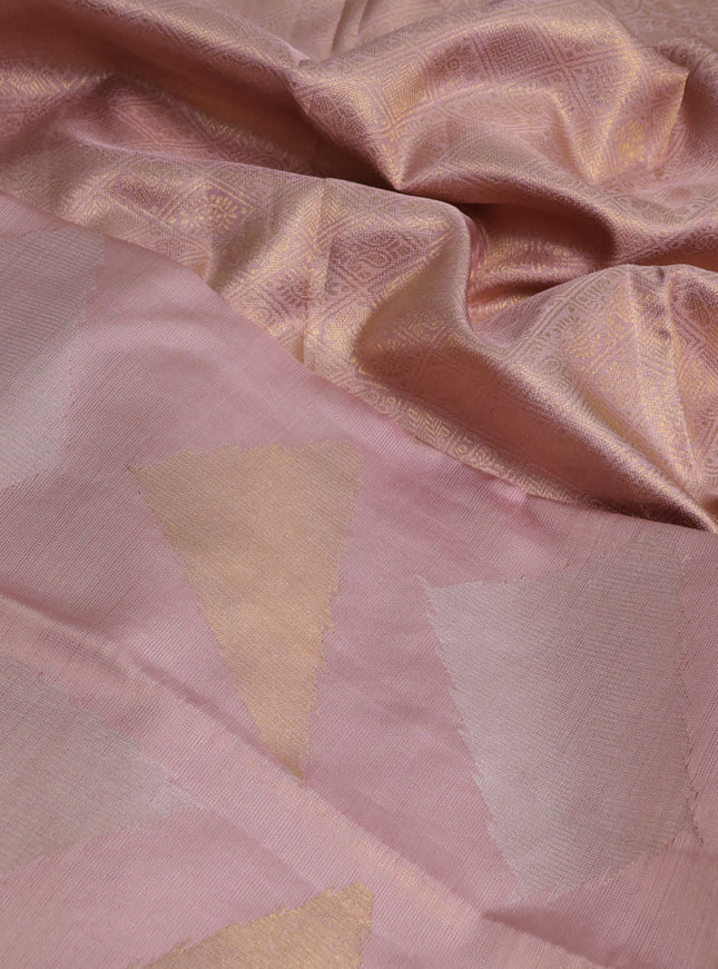 Pure kanchipuram silk saree pastel peach with allover zari woven geometric brocade weaves in borderless style