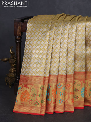 Pure kanchipuram tissue silk saree gold and red with allover zari woven geometric brocade weaves and zari woven paithani style border