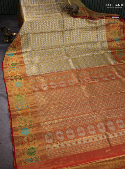 Pure kanchipuram tissue silk saree gold and red with allover zari woven geometric brocade weaves and zari woven paithani style border