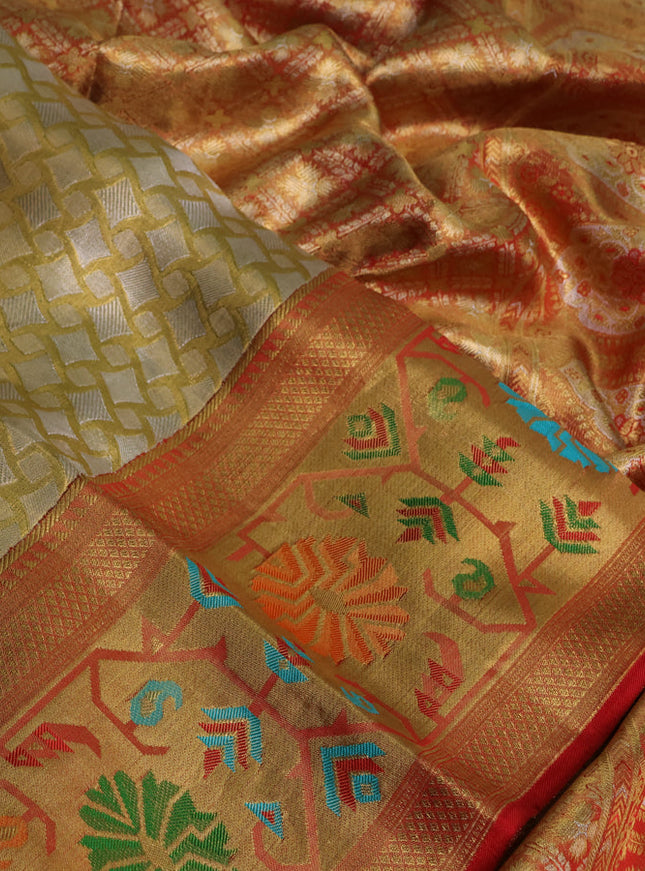 Pure kanchipuram tissue silk saree gold and red with allover zari woven geometric brocade weaves and zari woven paithani style border