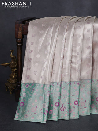 Pure kanchipuram tissue silk saree silver and teal blue with annam & rudhraksha zari woven buttas and rich zari woven border