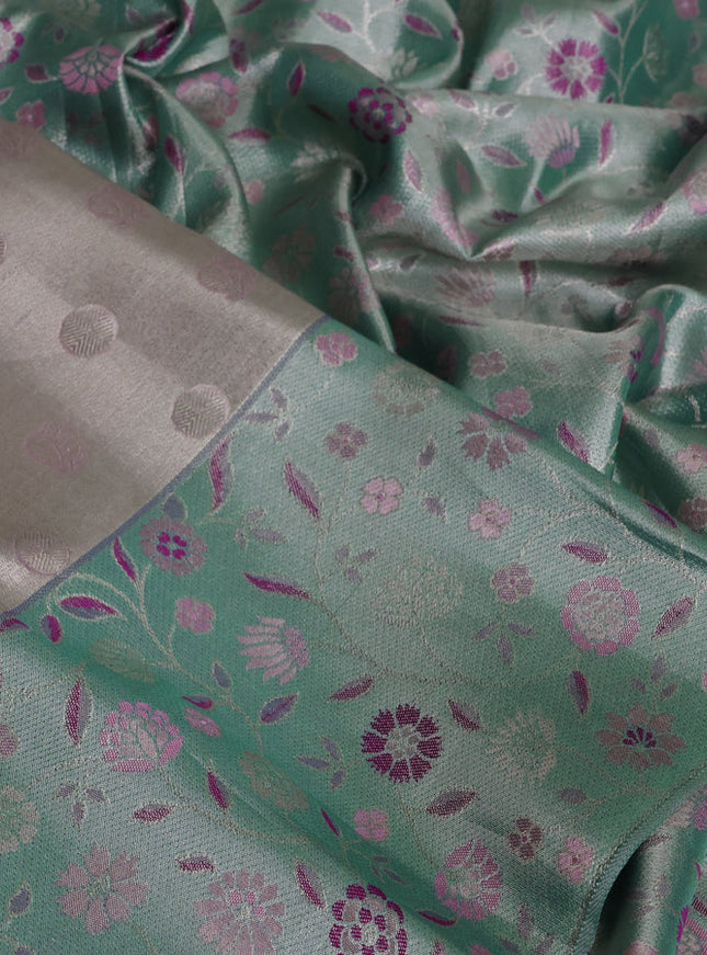 Pure kanchipuram tissue silk saree silver and teal blue with annam & rudhraksha zari woven buttas and rich zari woven border