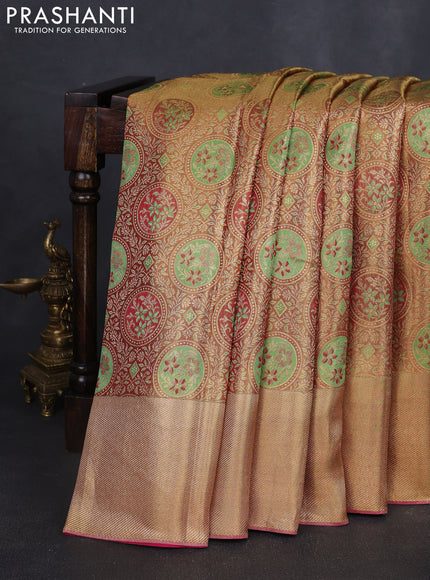 Pure kanchipuram tissue silk saree dual shade of gold and pink with allover zari woven floral brocade weaves and zari woven border