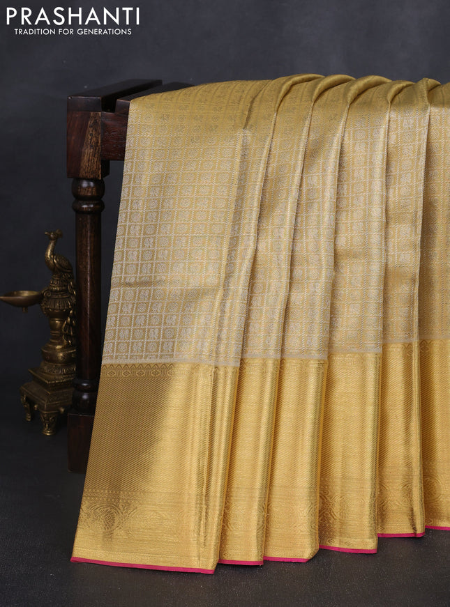 Pure kanchipuram tissue silk saree gold and pink with allover zari woven brocade weaves and long zari woven border