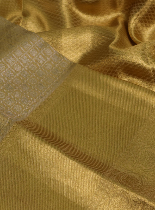 Pure kanchipuram tissue silk saree gold and pink with allover zari woven brocade weaves and long zari woven border
