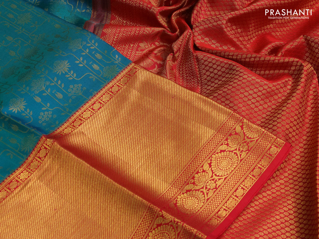 Pure kanchipuram silk saree dual shade of teal bluish green and red with allover zari woven brocade weaves and zari woven border