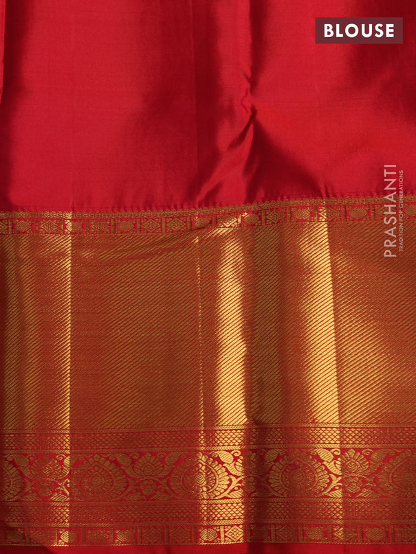 Pure kanchipuram silk saree dual shade of teal bluish green and red with allover zari woven brocade weaves and zari woven border