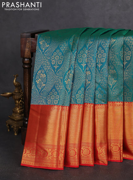 Pure kanchipuram silk saree dual shade of teal bluish green and red with allover zari woven brocade weaves and zari woven border