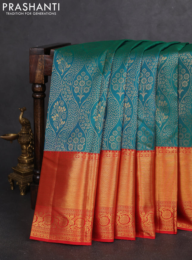 Pure kanchipuram silk saree dual shade of teal bluish green and red with allover zari woven brocade weaves and zari woven border