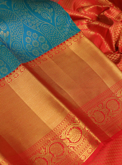 Pure kanchipuram silk saree dual shade of teal bluish green and red with allover zari woven brocade weaves and zari woven border