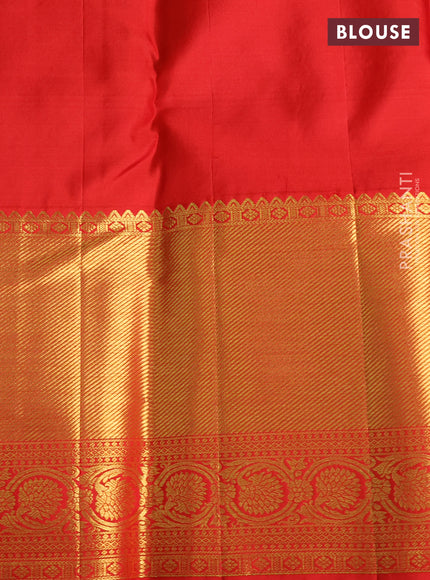 Pure kanchipuram silk saree dual shade of teal bluish green and red with allover zari woven brocade weaves and zari woven border