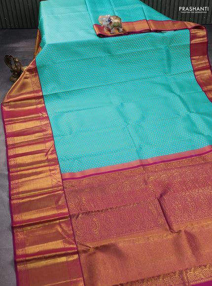 Pure kanchipuram silk saree teal blue and magenta pink with allover zari woven 1000 butta weaves and zari woven border
