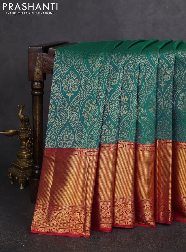 Pure kanchipuram silk saree dual shade of teal bluish green and red with allover zari woven brocade weaves and zari woven border
