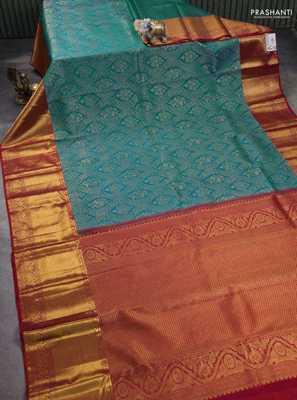Pure kanchipuram silk saree dual shade of teal bluish green and red with allover zari woven brocade weaves and zari woven border