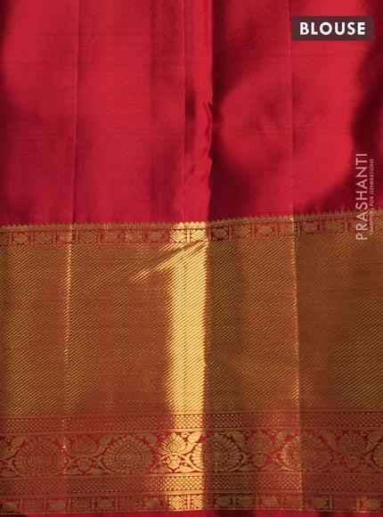 Pure kanchipuram silk saree dual shade of teal bluish green and red with allover zari woven brocade weaves and zari woven border