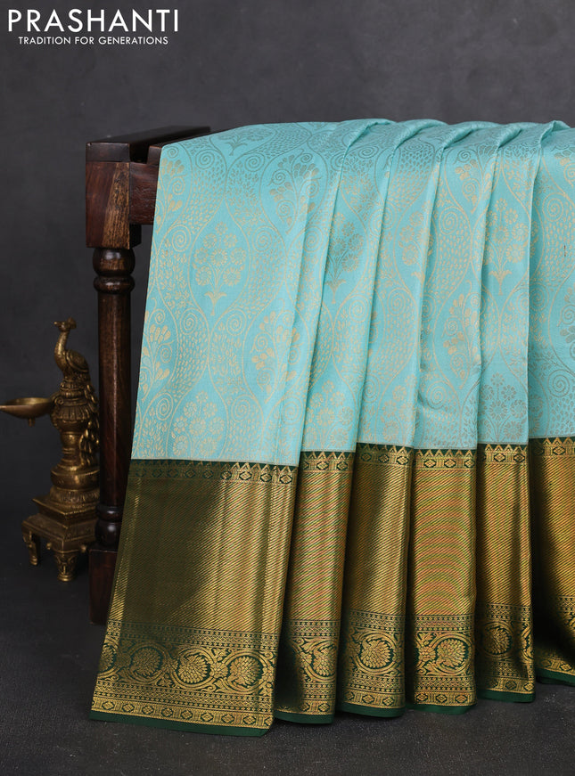 Pure kanchipuram silk saree light blue and green with allover zari woven brocade weaves and zari woven border