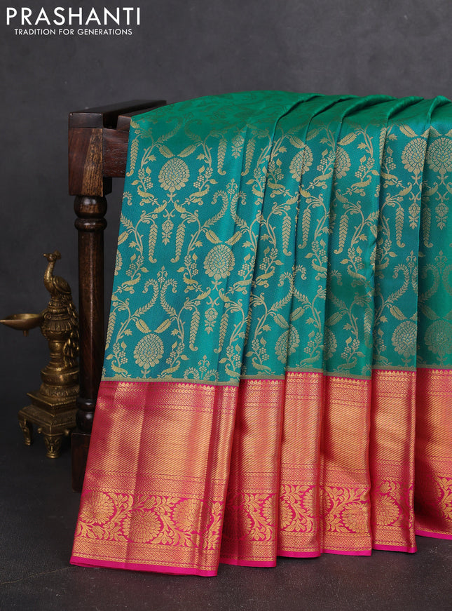 Pure kanchipuram silk saree dual shade of teal bluish green and pink with allover zari woven brocade weaves and zari woven border