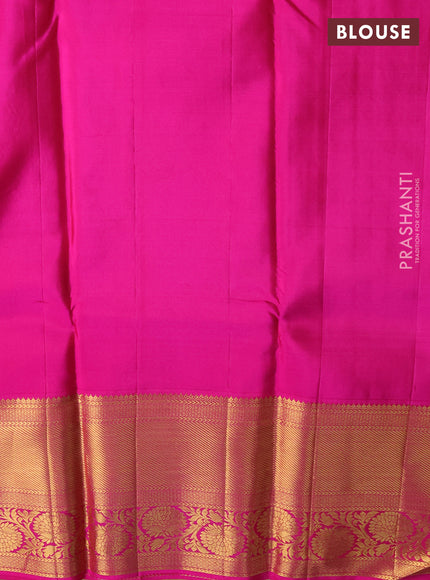 Pure kanchipuram silk saree dual shade of teal bluish green and pink with allover zari woven brocade weaves and zari woven border