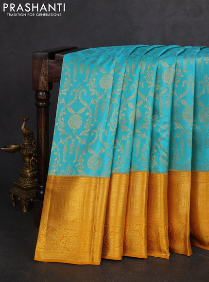 Pure kanchipuram silk saree teal blue and mustard yellow with allover zari woven brocade weaves and zari woven border