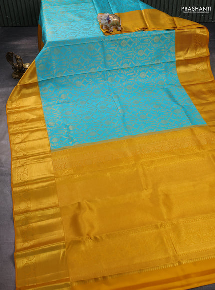 Pure kanchipuram silk saree teal blue and mustard yellow with allover zari woven brocade weaves and zari woven border
