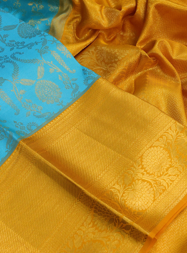 Pure kanchipuram silk saree teal blue and mustard yellow with allover zari woven brocade weaves and zari woven border