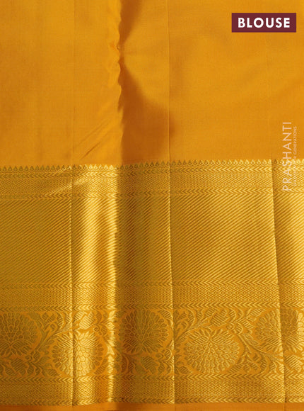 Pure kanchipuram silk saree teal blue and mustard yellow with allover zari woven brocade weaves and zari woven border