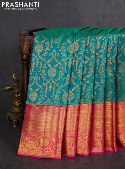 Pure kanchipuram silk saree dual shade of teal bluish green and pink with allover zari woven brocade weaves and zari woven border