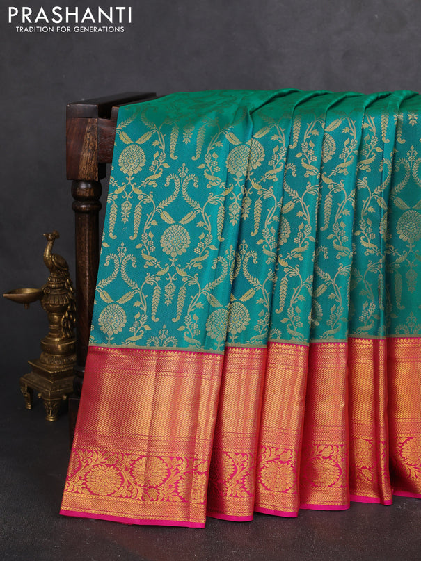 Pure kanchipuram silk saree dual shade of teal bluish green and pink with allover zari woven brocade weaves and zari woven border