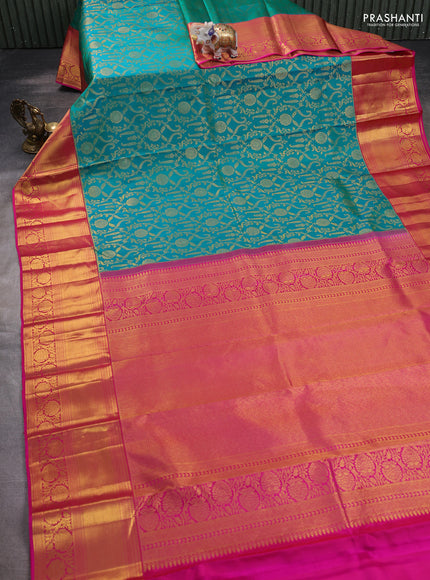 Pure kanchipuram silk saree dual shade of teal bluish green and pink with allover zari woven brocade weaves and zari woven border